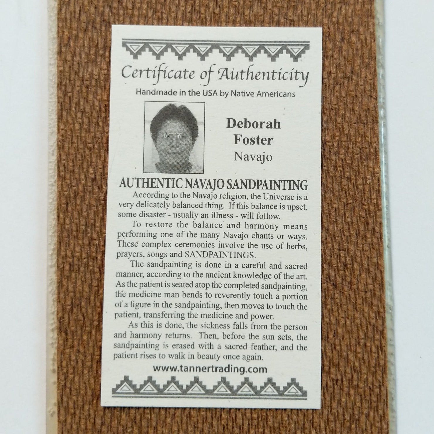 Close up of the Certificate of Authenticity and Artist information. 