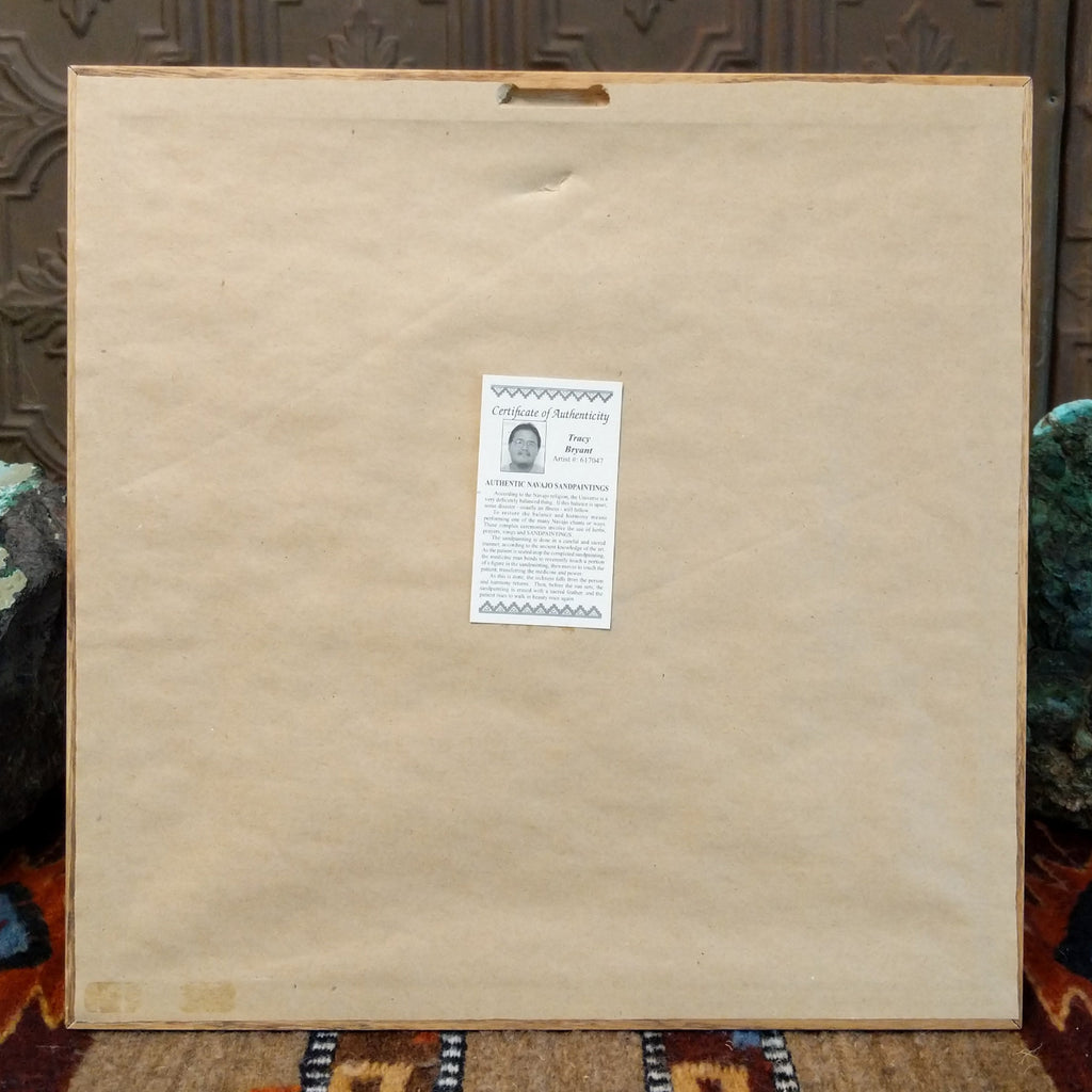 The back features a place to hook the painting and the authentication tag.