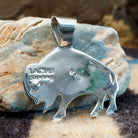Close-up of the artisan's stamped signature.