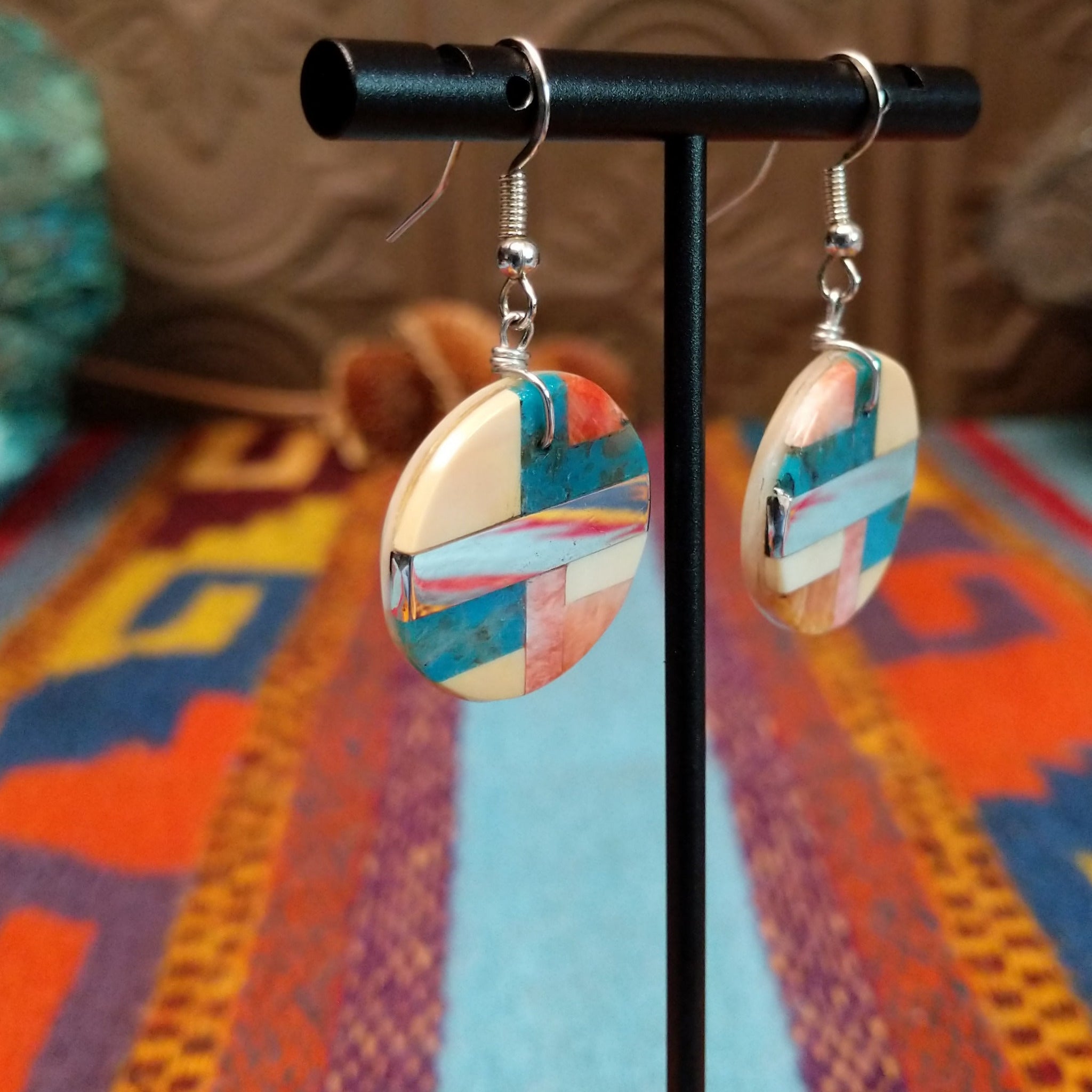 Multistone Circle Earrings by A. Medina with geometric stone and shell mosaic inlay.