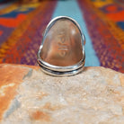 Multistone Cluster Ring by Raymond Coriz featuring turquoise, coral, lapis, and orange-toned stones set in Sterling Silver with polished silver bead accents; underside view.