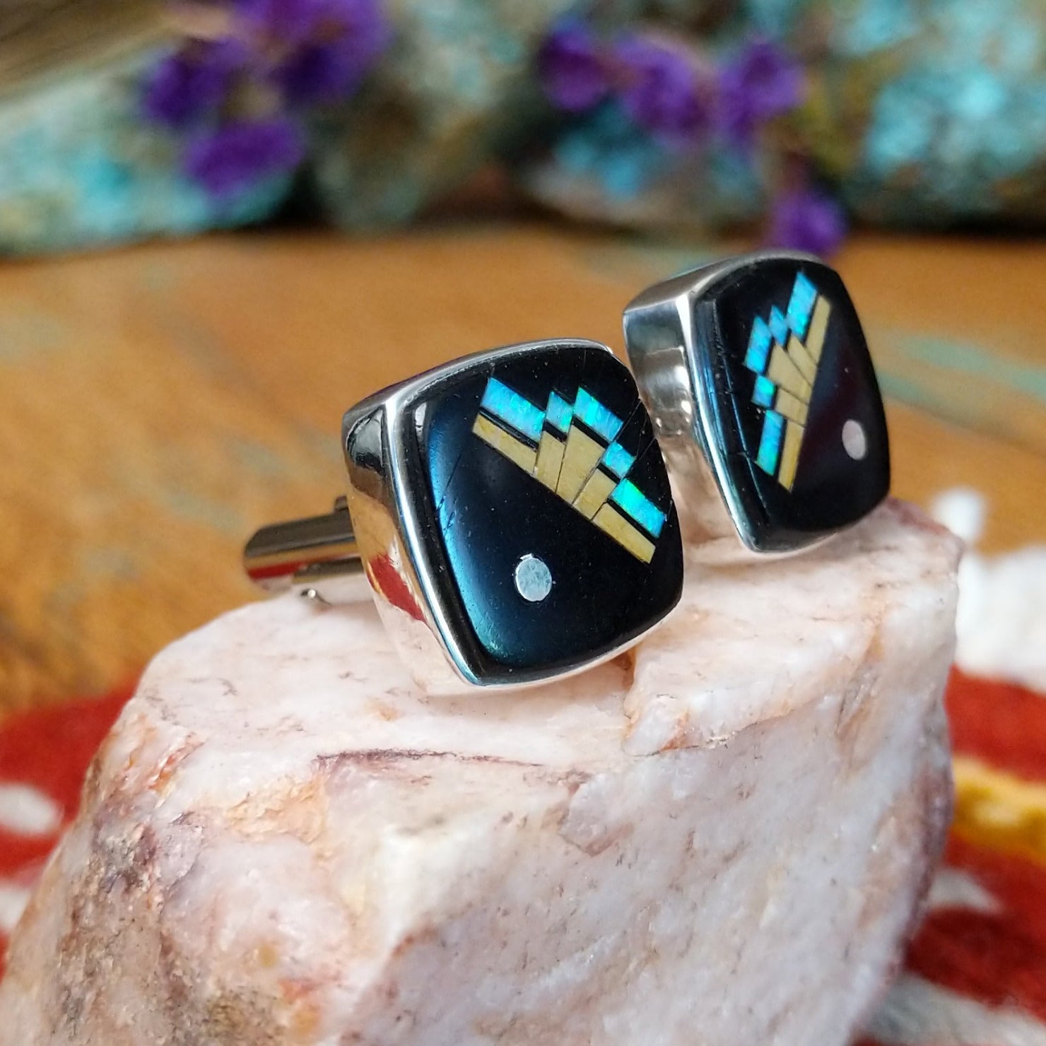 Sterling silver Ambrose Tsosie cuff links with black inlay and geometric multistone design.