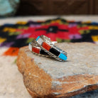 Multistone inlay hoop earrings by Malcolm Chavez with twisted silver borders.