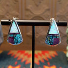 Sterling silver triangular earrings with multistone inlay set in the bezel.