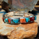 Sterling silver multistone inlay link bracelet by Cooper Willie with colorful Southwestern stone inlay.