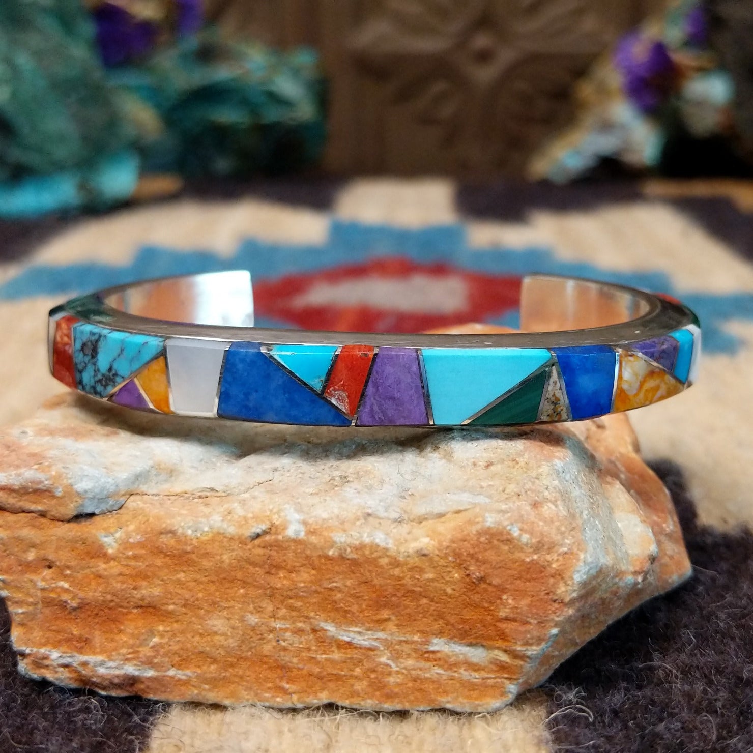 Multistone Medley cuff by Elsie Yellowhorse, featuring a colorful arrangement of natural stones set in handcrafted Southwestern-inspired metalwork.