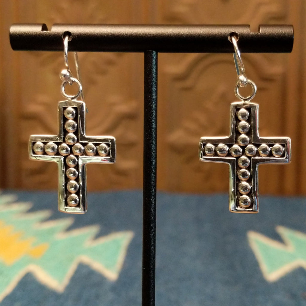 Sterling silver cross earrings with beaded accents on the interior bezels.