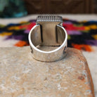 Navajo black onyx ring by J.P.J. with stamped silver band.