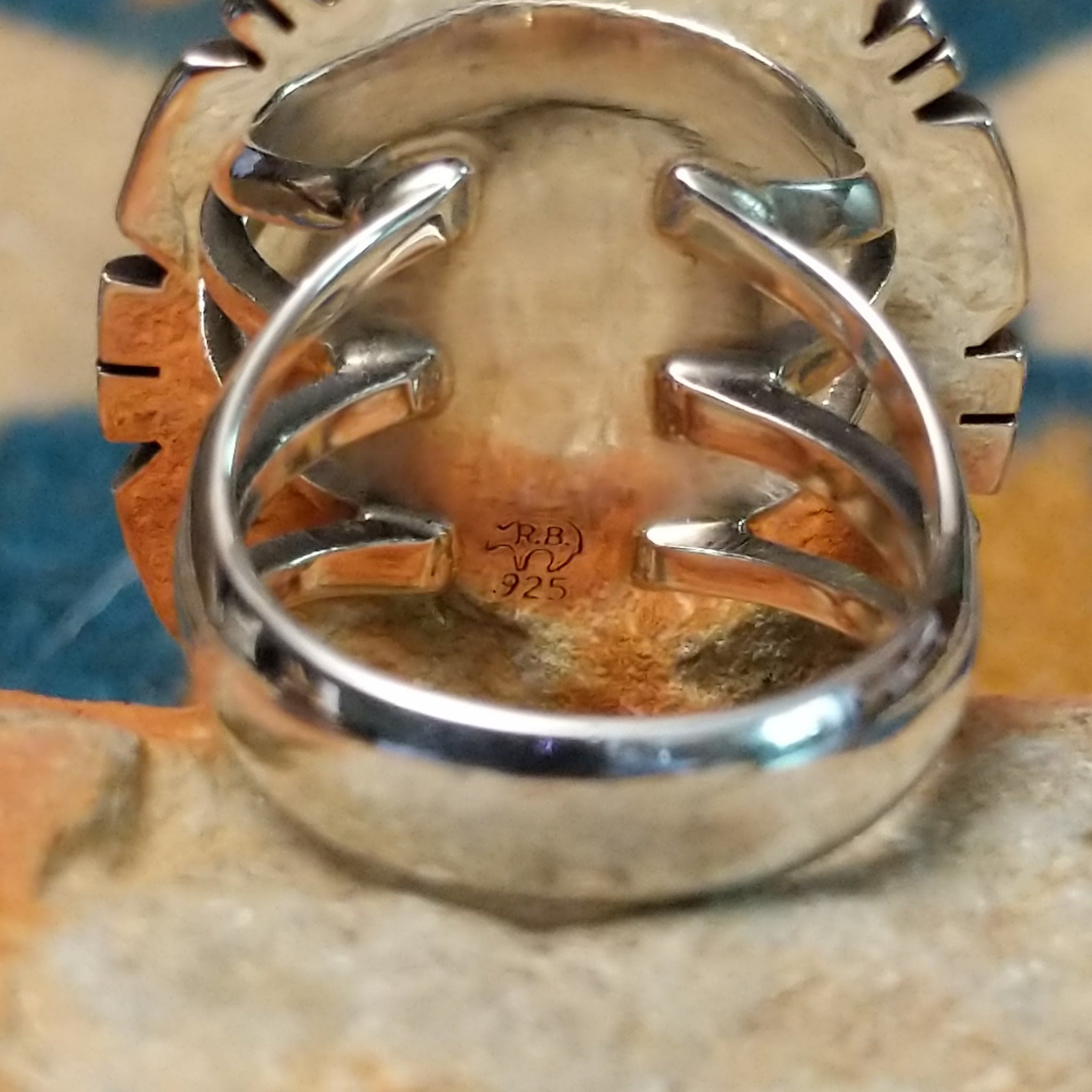 Navajo sterling silver ring with an oval Charoite stone in shades of purple with natural black inclusions; artisan and .925 (Sterling Silver) stamp.