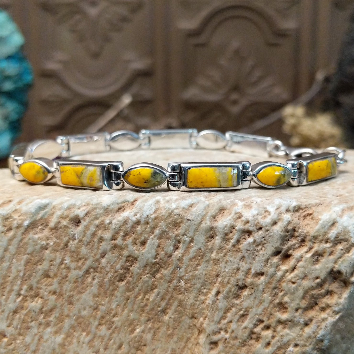 Sterling silver link bracelet with bumblebee jasper set in geometric bezels.