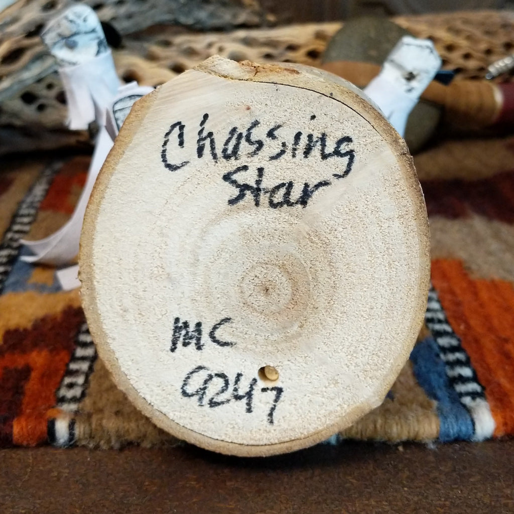 The artisan's initials and title of the piece is found on the underside of the base.