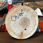 The base of the piece showcases the title.