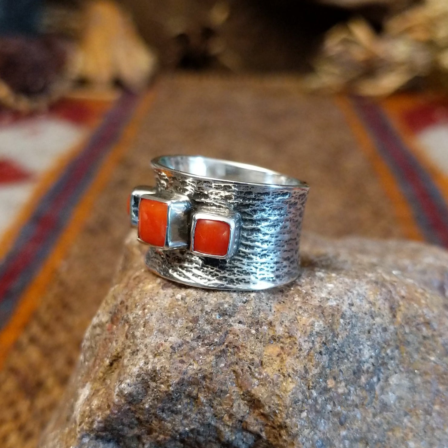 Sterling silver ring with coral set in square bezels.
