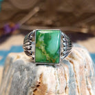Sterling silver ring with Sonoran gold turquoise set in a square bezel and draped band.