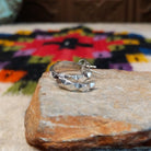 Navajo faceted silver hoop earrings.