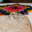 Navajo faceted silver hoop earrings.