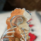 Close up of the artist's stamped signature