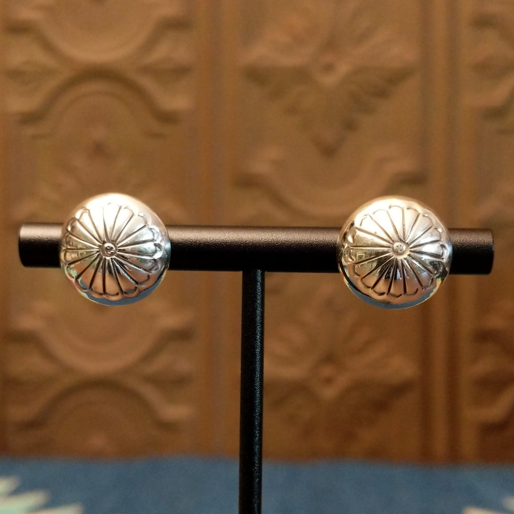 Dome earrings with floral accents.