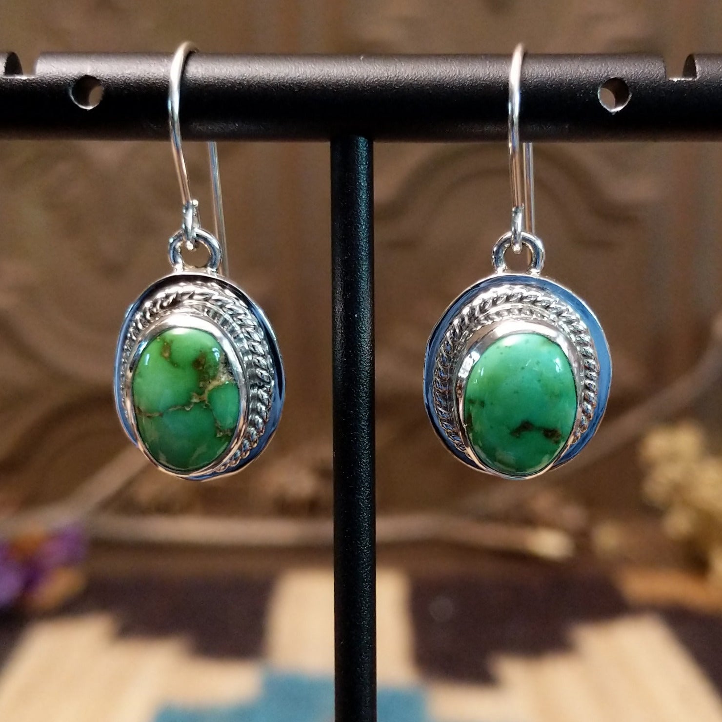 Sterling silver earrings with Sonoran gold turquoise set in raised bezels, framed by twisted rope.