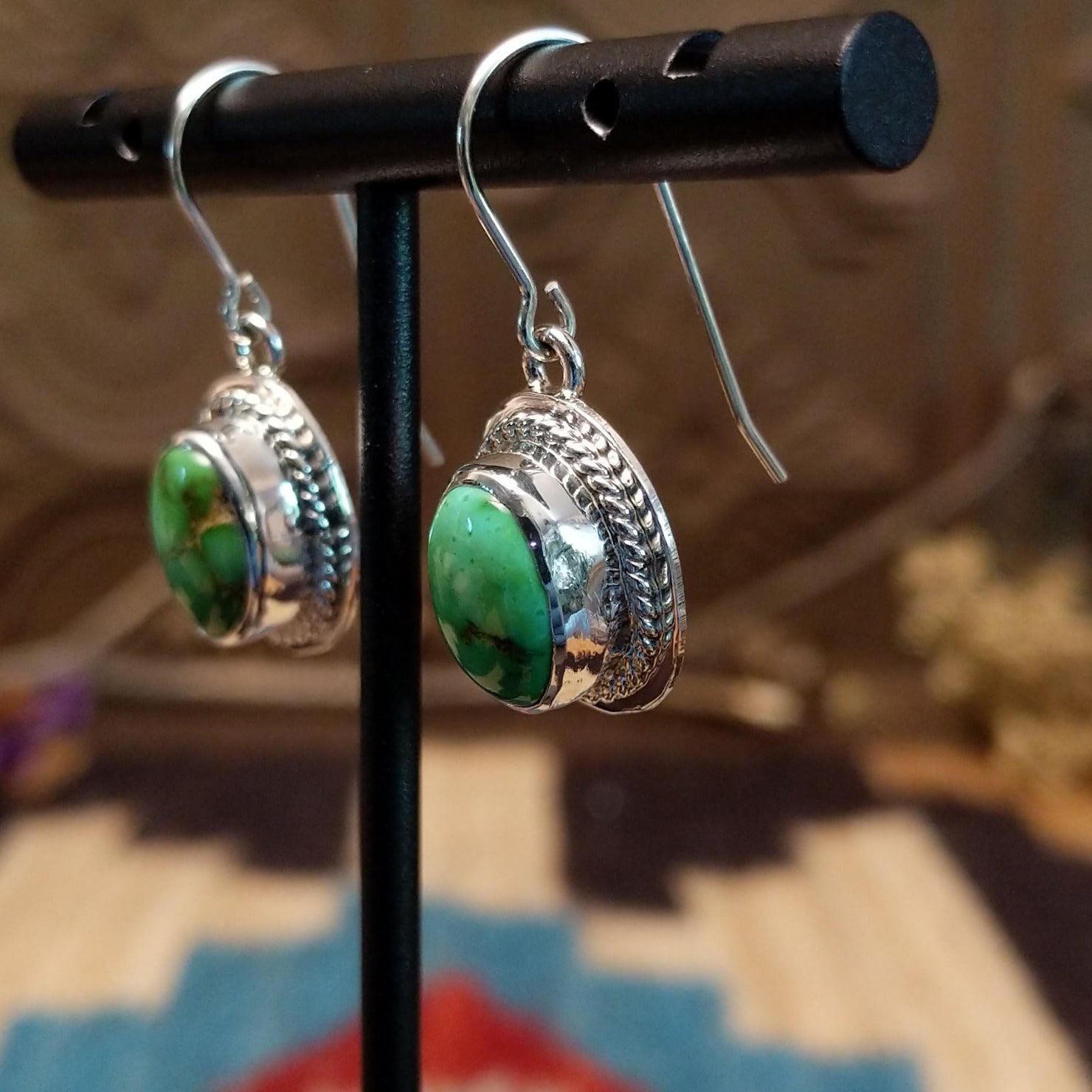 Sterling silver earrings with Sonoran gold turquoise set in raised bezels, framed by twisted rope.