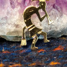 The gold stamp is found on the back of the pendant.