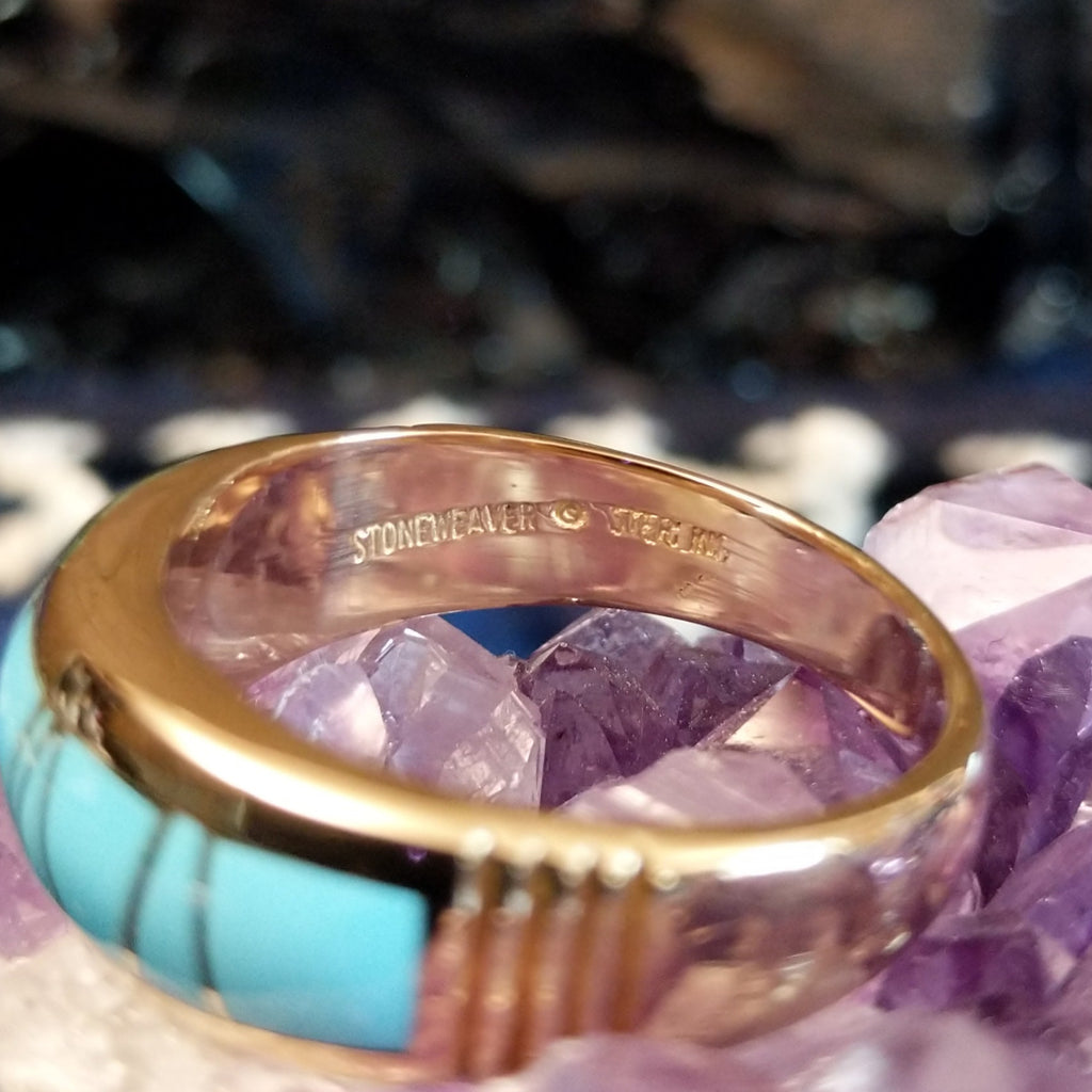 The maker is stamped into the inside of the ring.