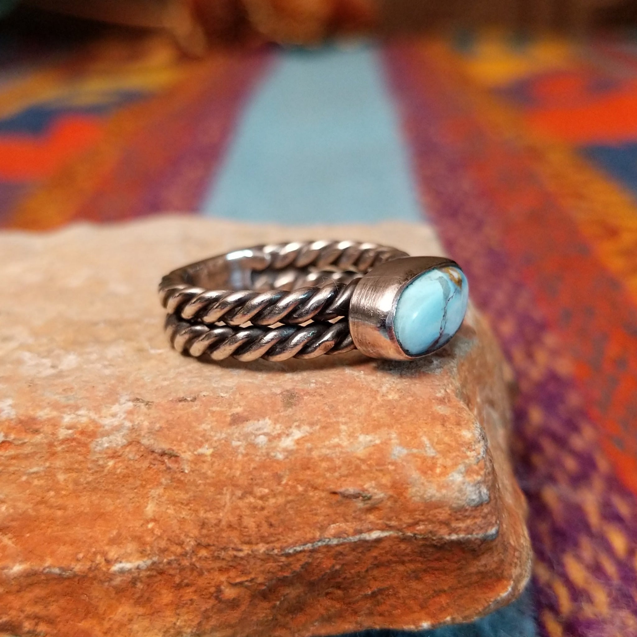 Navajo silver ring with oval Golden Hills turquoise and double twisted band.