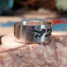 Solid sterling silver ring with Navajo-inspired designs.