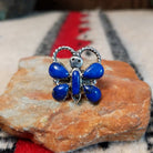 Navajo lapis butterfly ring by P.W. with twisted silver wire antennae.