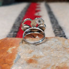 Navajo lapis butterfly ring by P.W. with twisted silver wire antennae.