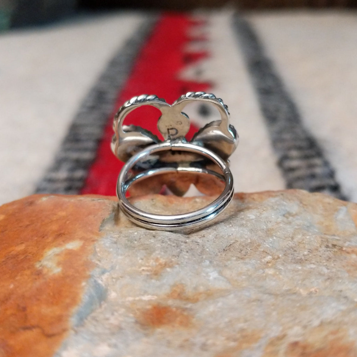 Navajo lapis butterfly ring by P.W. with twisted silver wire antennae.