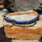 Navajo lapis inlay link bracelet with deep blue lapis set in handcrafted sterling silver.