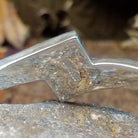 Close-up of the sterling silver hallmark.