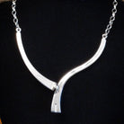 Close-up of the sterling silver hallmark.