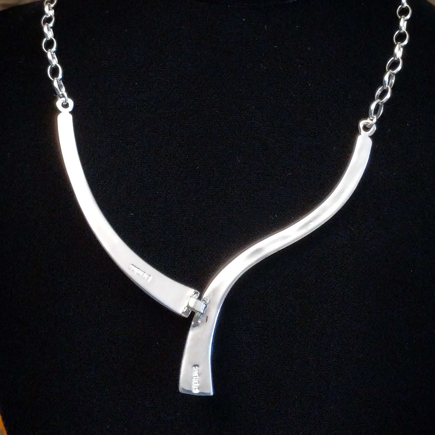 Close-up of the sterling silver hallmark.