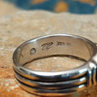 Handcrafted sterling silver Navajo lapis oval ring by D.C., featuring a rich blue oval lapis gemstone in a classic bezel setting; artisan and Sterling Silver stamp.