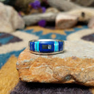 Sterling silver Navajo inlay ring with Lapis Lazuli, Turquoise, and geometric accents.