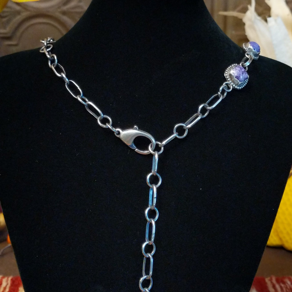 A close-up of the sterling silver adjustable clasp.