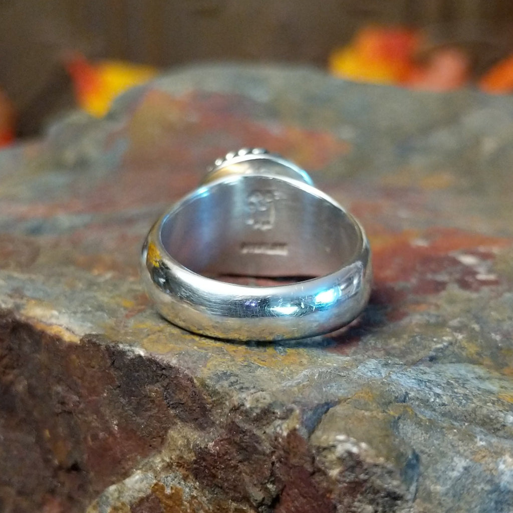 The back of the ring features the tapered sterling silver band.