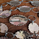 artist mark on buckle of coral concho belt