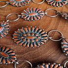 close up buckle coral concho belt