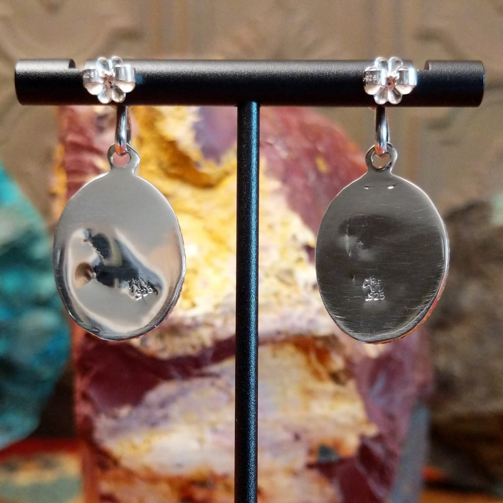 The back of the earrings are stamped with the sterling silver authentication.