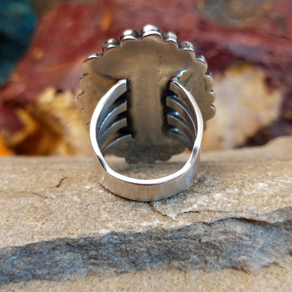 The band of the ring is tapered and polished.