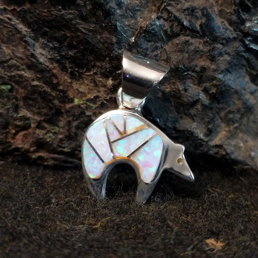 Spirit bear inlaid with manmade opal in sterling silver.
