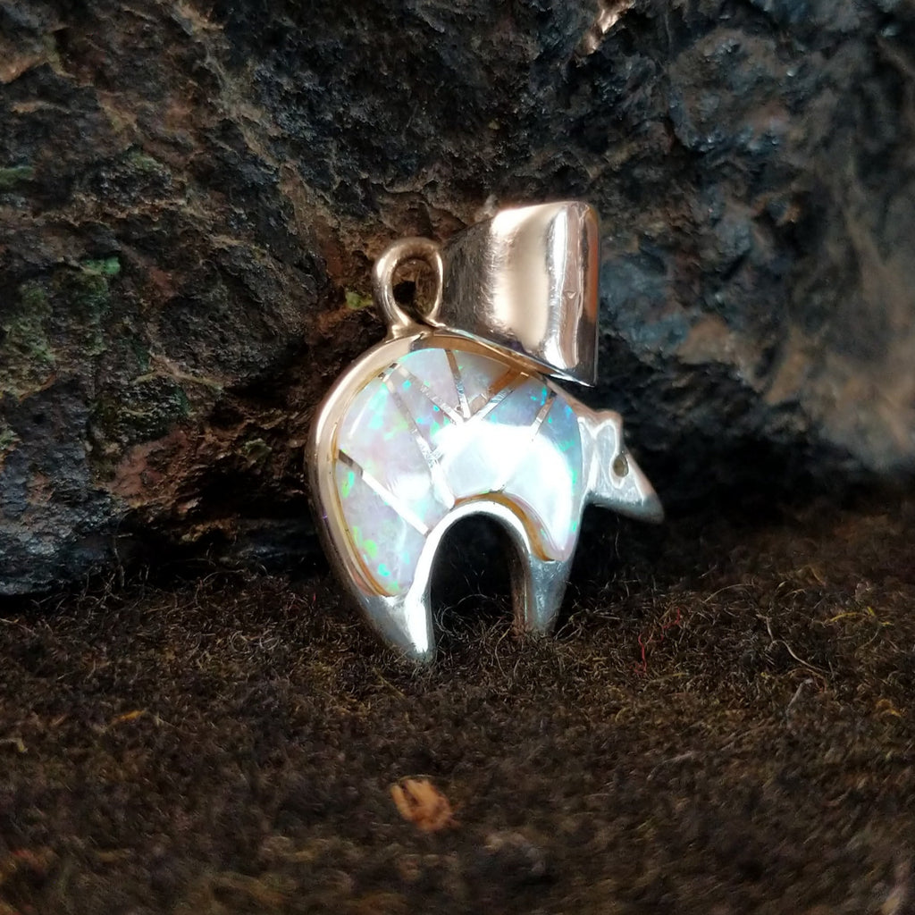 Spirit bear inlaid with manmade opal in sterling silver.