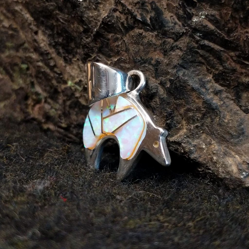 Spirit bear inlaid with manmade opal in sterling silver.