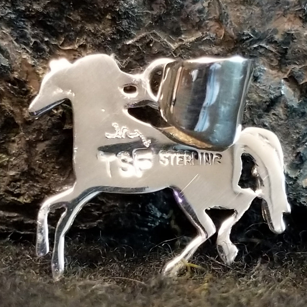 The back features the stamped authentication.