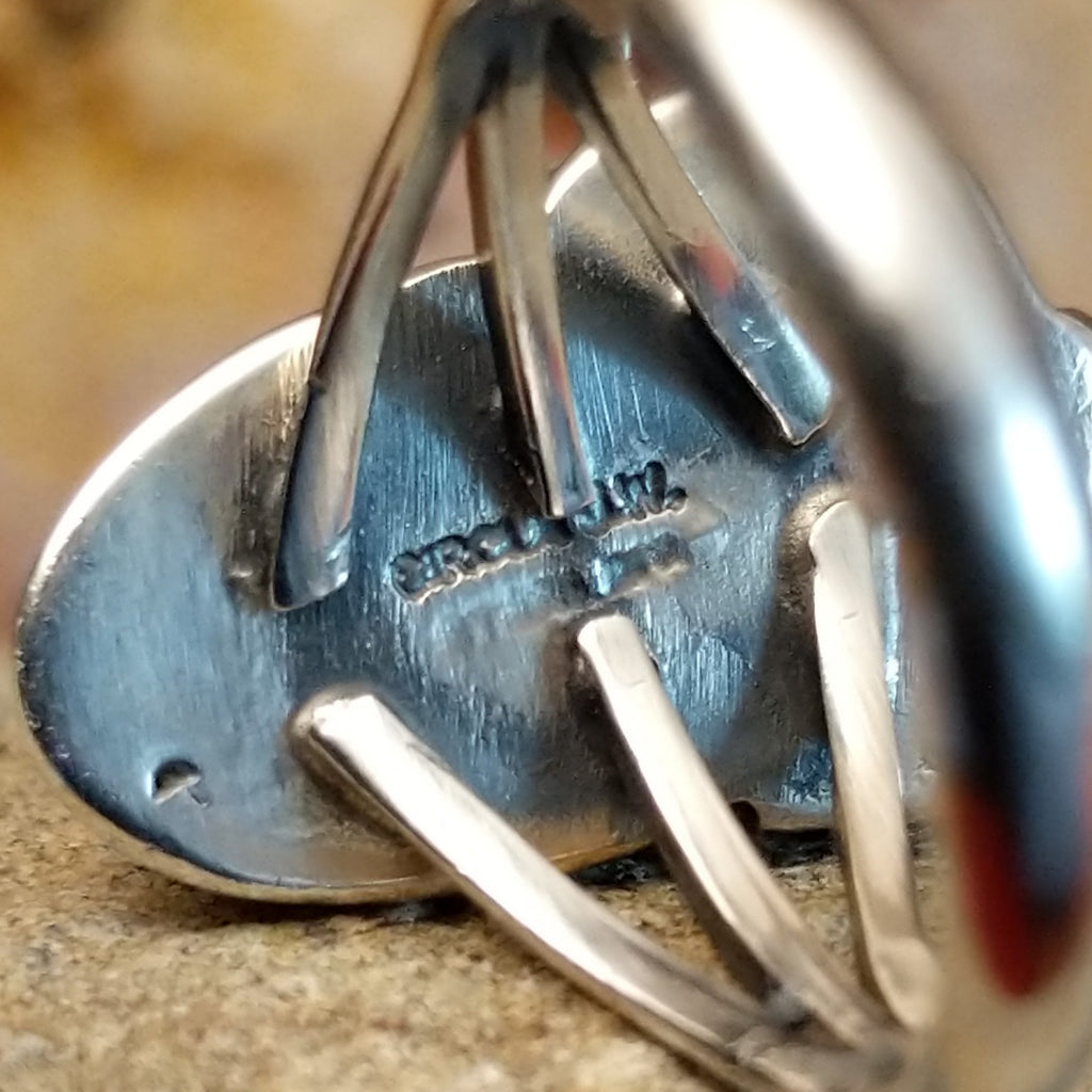 The stamp is found on the underside of the setting.