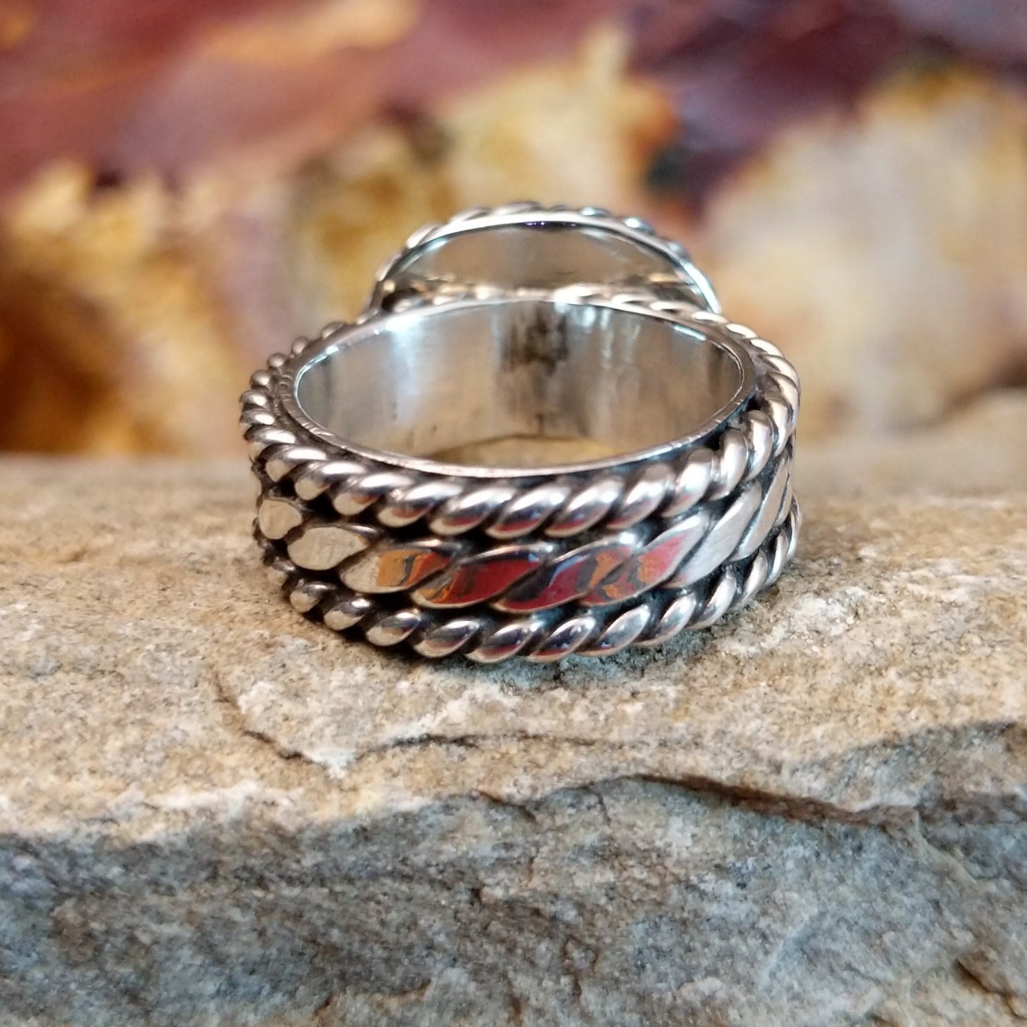 A detailed view of the twisted rope layered band.