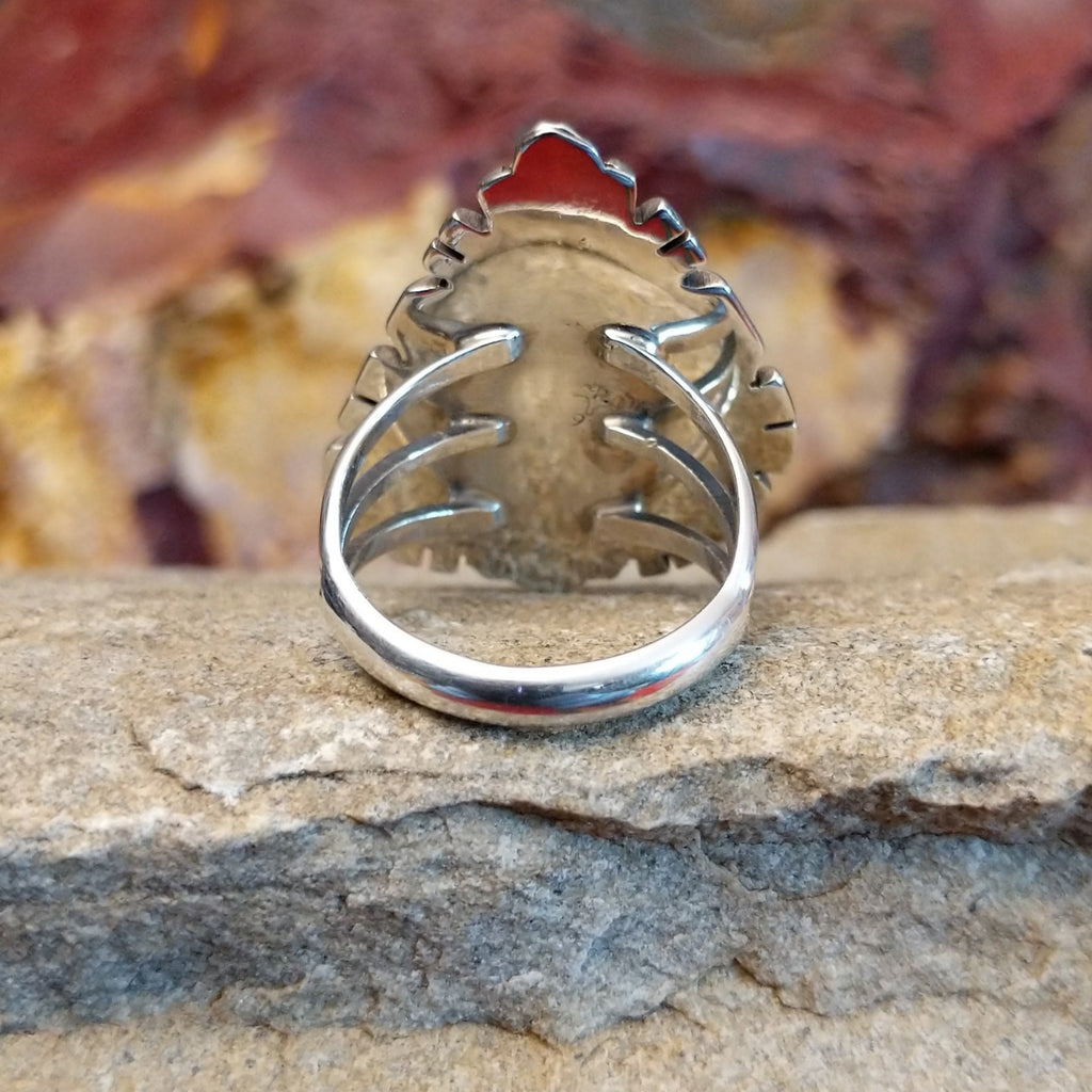 The thin band tapers toward the center.